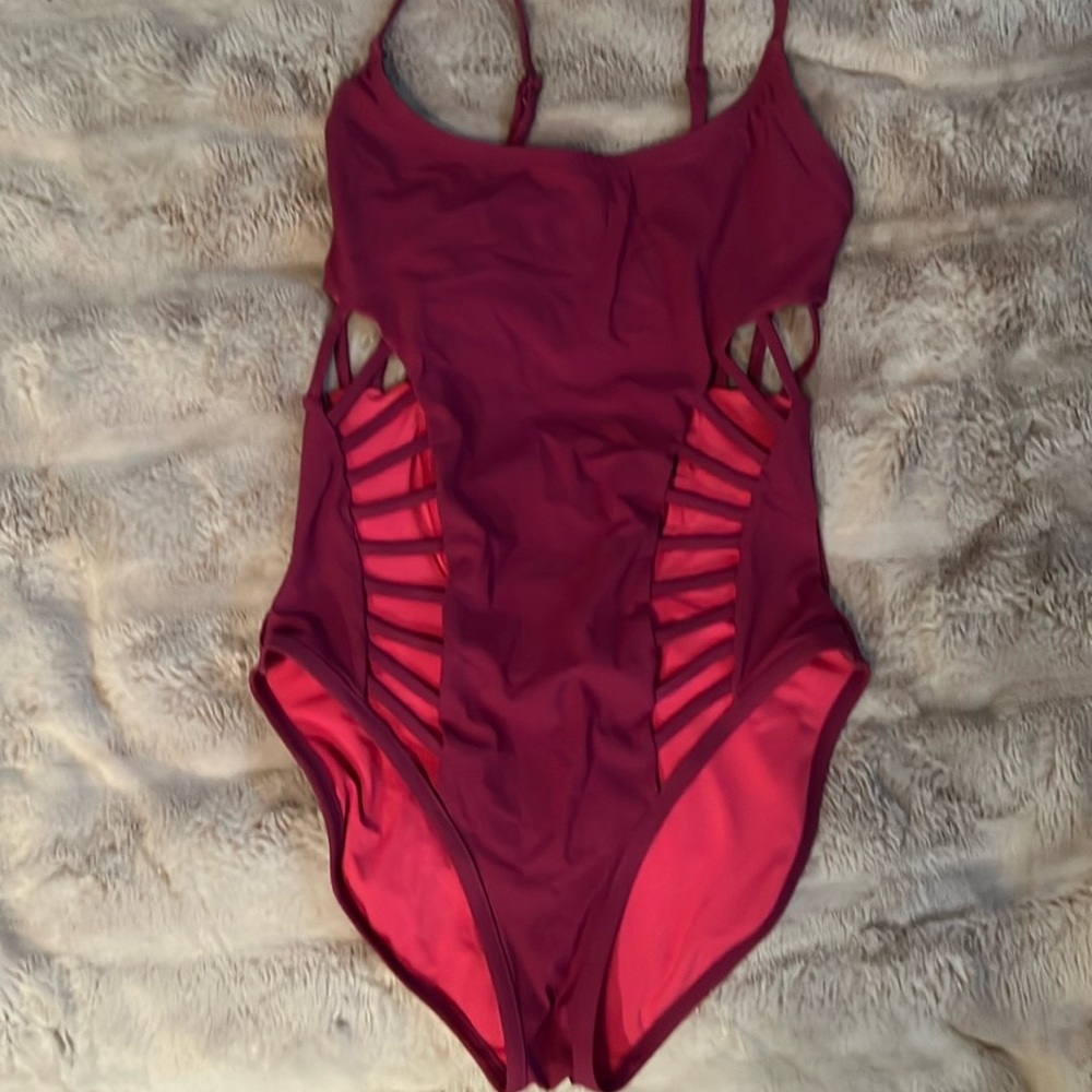 Magenta cut-out one-piece swimsuit